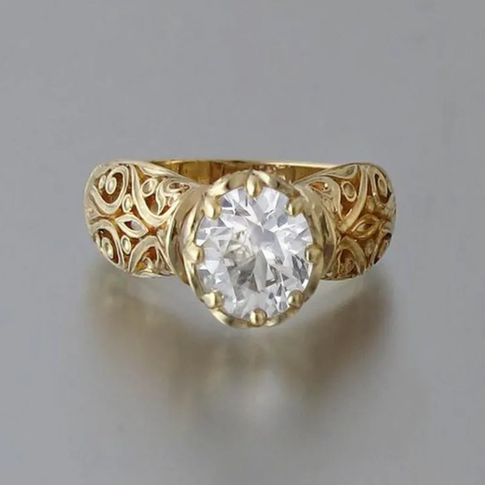 Serti Lumineux | Bague dorée avec grande pierre claire – Vue 01