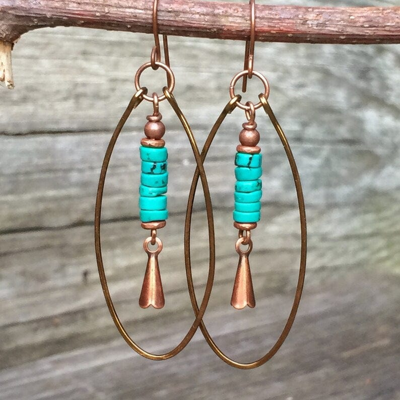 Barre Ovale | Boucles d'oreilles avec disques turquoise plats dans un cadre ovale – Vue 01