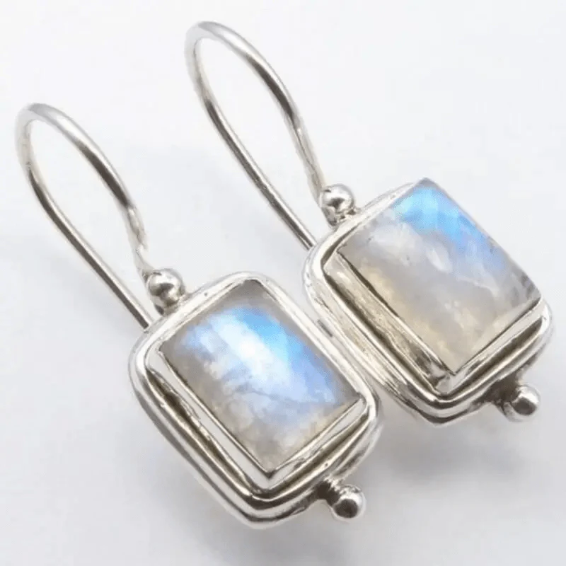 Éclat Plat | Boucles d'oreilles argentées avec pierres claires rectangulaires – Vue 01