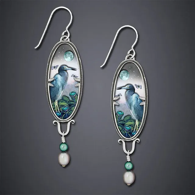 Oiseau Bleu | Boucles d'oreilles à motif d'oiseau et perle blanche – Vue 01