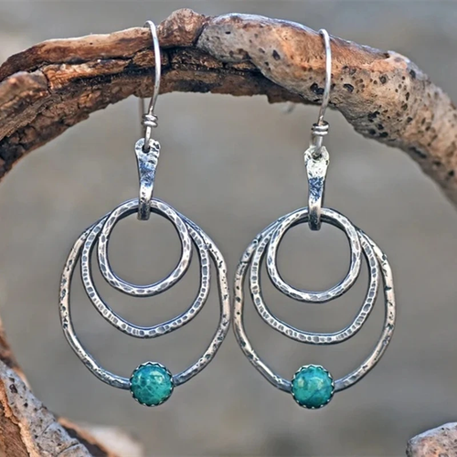 Danse de Cercles | Boucles d'oreilles argentées avec pierre turquoise – Vue 01