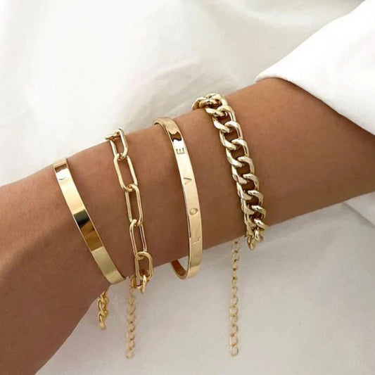 Élan | Ensemble de quatre bracelets et joncs dorés – Vue 01