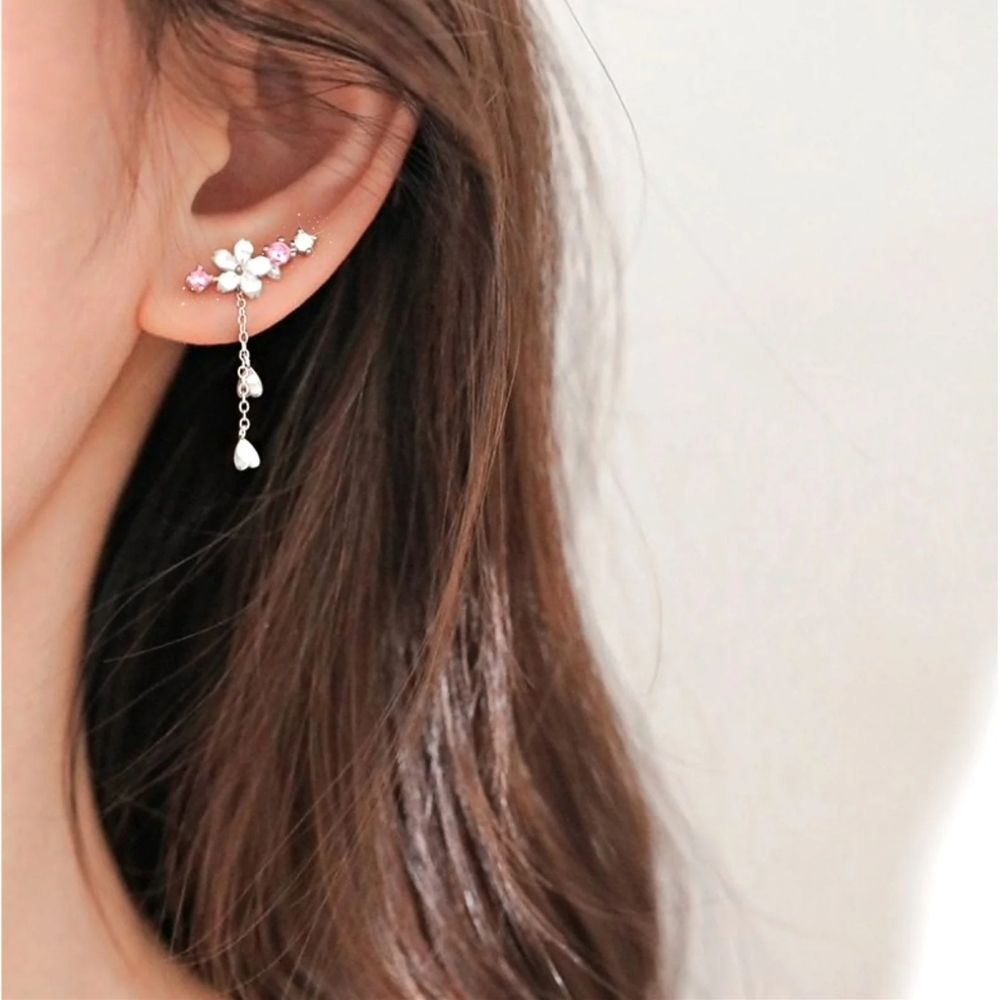Disque Fleuri | Boucles d'oreilles dorées à motif floral – Vue 01