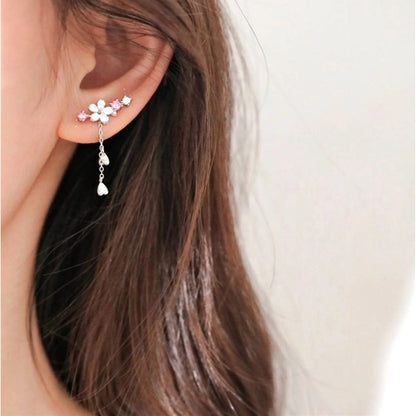 Disque Fleuri | Boucles d'oreilles dorées à motif floral – Vue 01