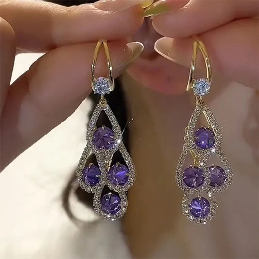 Semis Améthyste | Boucles d'oreilles argentées et dorées avec pierre violette – Vue 01