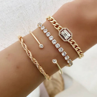 Domitia | Ensemble de quatre bracelets dorés – Vue 01