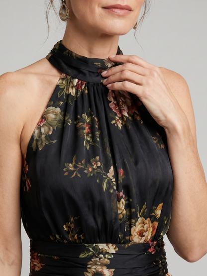 Agnès — Robe longue dos nu à fleurs sur fond noir