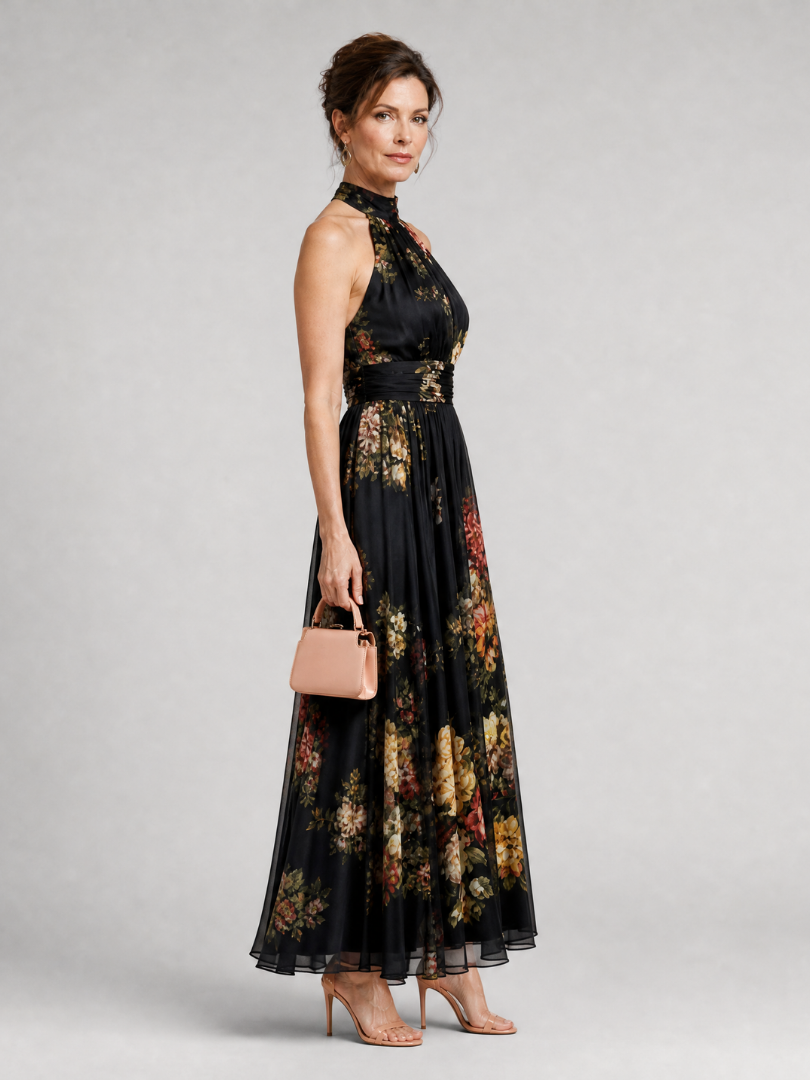 Agnès — Robe longue dos nu à fleurs sur fond noir
