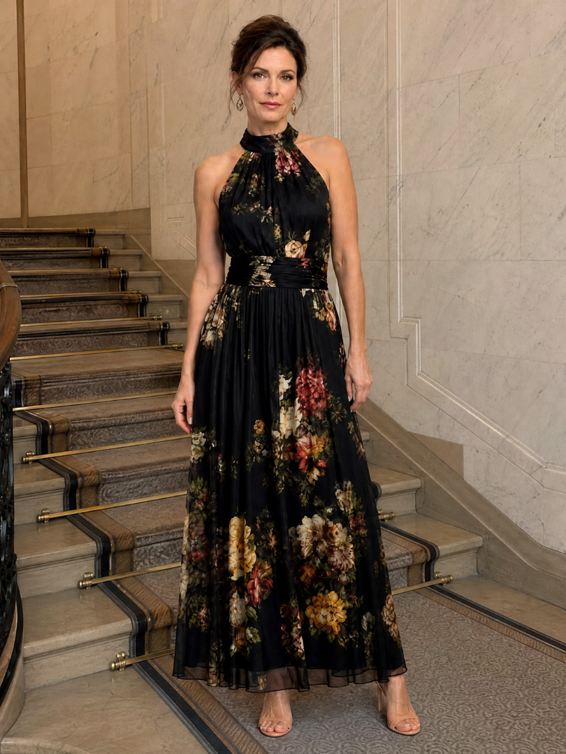 Agnès — Robe longue dos nu à fleurs sur fond noir
