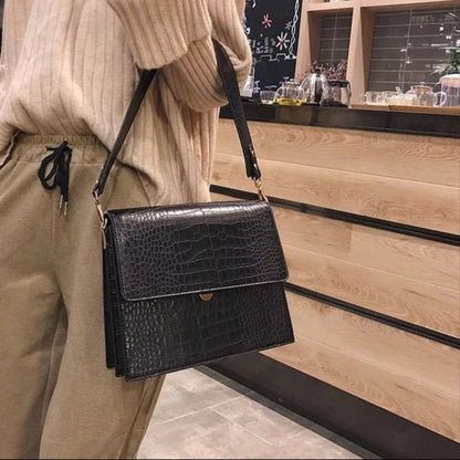 Sac bandoulière Croco Bureau noir vu de trois quarts